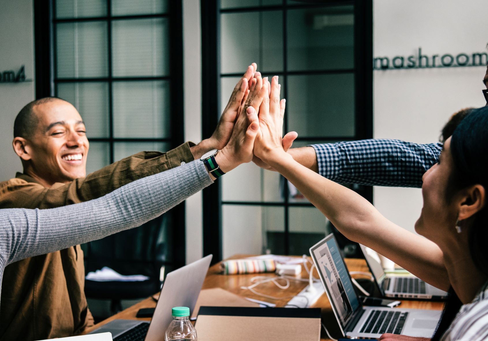 staff scheduling teamwork high five